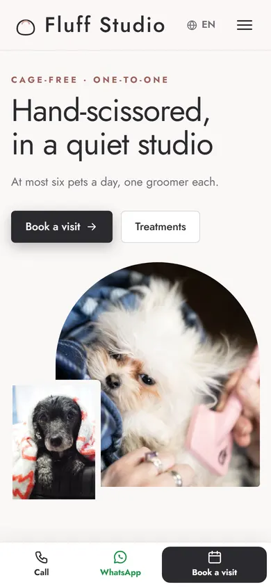 Fluff Studio · Boutique Grooming on a phone